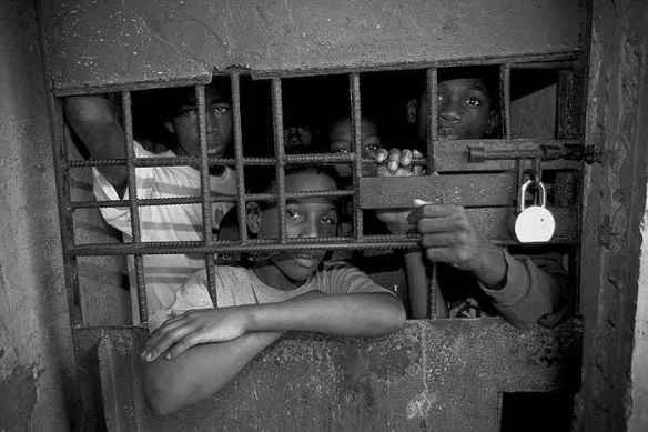 Young boys in a Jamaican prison cell, 2007. Photo © Gary S. Chapman, from www.garyschapman.com